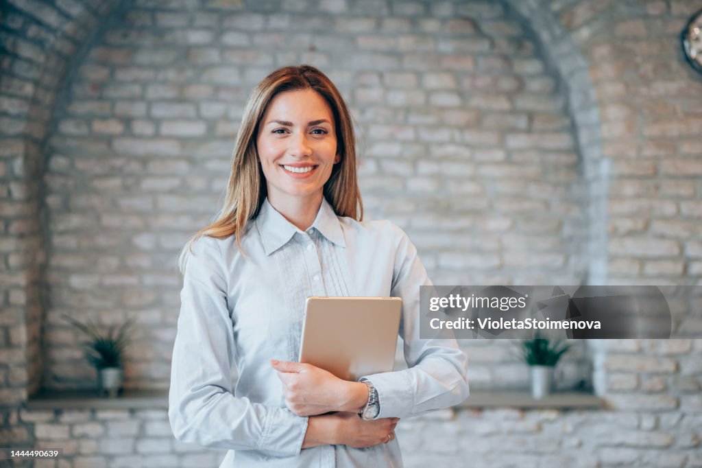 Confident businesswoman in modern office.