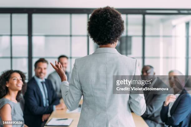 business persons on meeting in the office. - formal businesswear stock pictures, royalty-free photos & images
