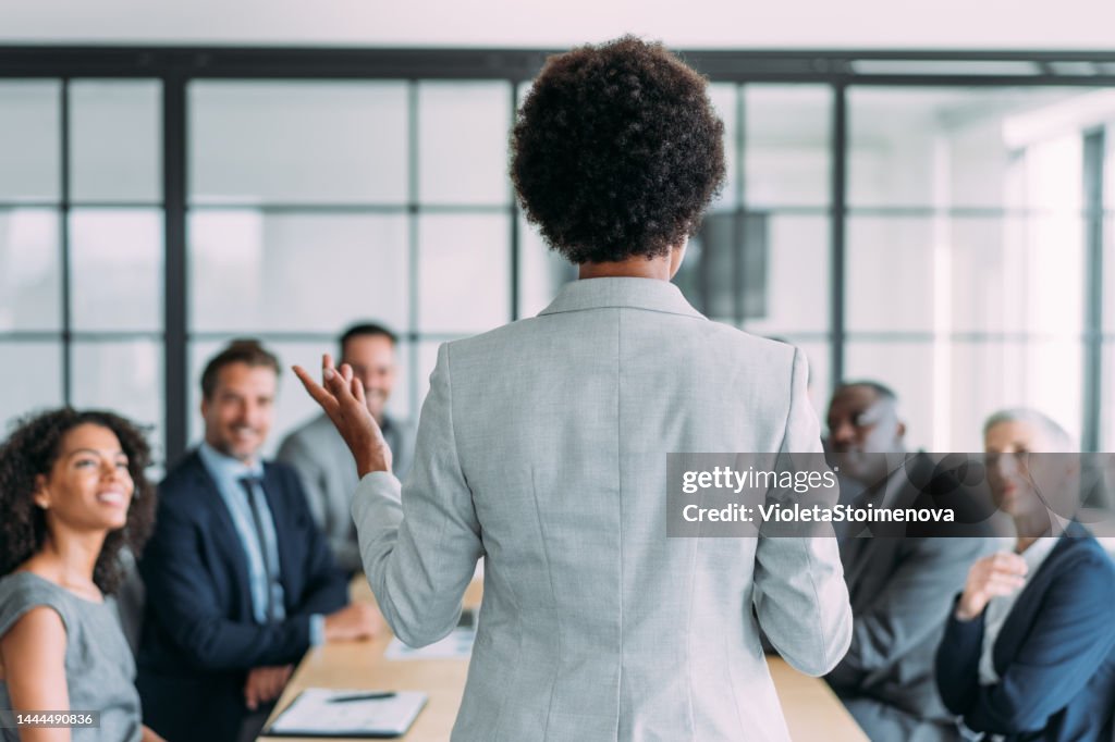 Business persons on meeting in the office.