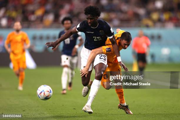 Jackson Porozo of Ecuador battles for possession with Steven Berghuis of Netherlands during the FIFA World Cup Qatar 2022 Group A match between...