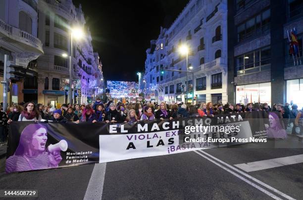 Group of women hold a 'Irene Montero Resignation' banner during a demonstration against macho violence, November 25 in Madrid, Spain. The protest has...