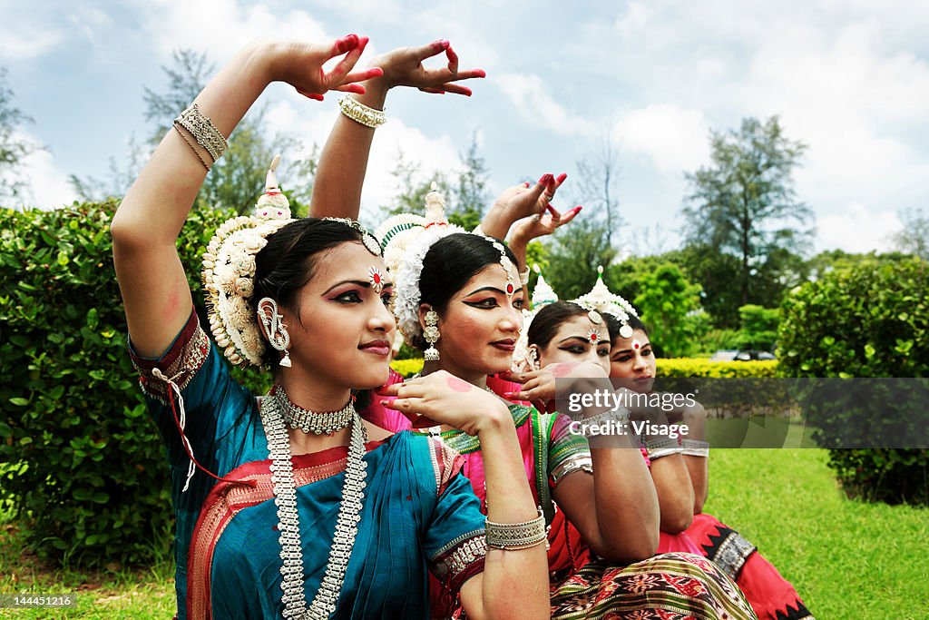 Odissi dancers striking a pose
