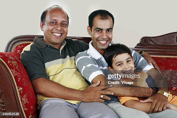 portrait of grandfather, father and grandson - receding stock pictures, royalty-free photos & images