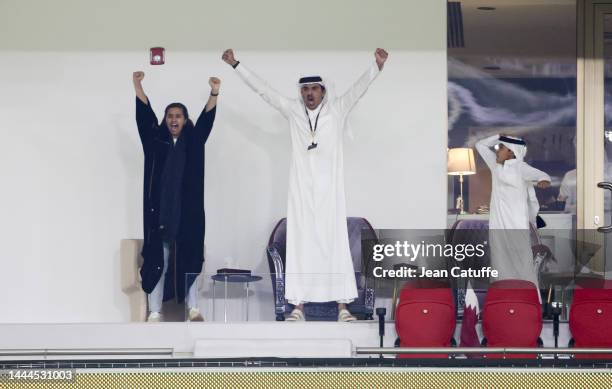 Qatar's Emir Sheikh Tamim bin Hamad al-Thani reacts during the FIFA World Cup Qatar 2022 Group A match between Qatar and Senegal at Al Thumama...