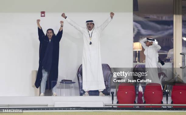 Qatar's Emir Sheikh Tamim bin Hamad al-Thani reacts during the FIFA World Cup Qatar 2022 Group A match between Qatar and Senegal at Al Thumama...