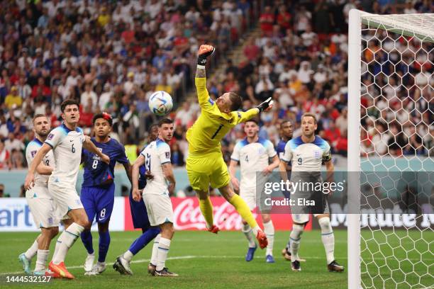 Jordan Pickford of England defends a United States attempt during the FIFA World Cup Qatar 2022 Group B match between England and USA at Al Bayt...