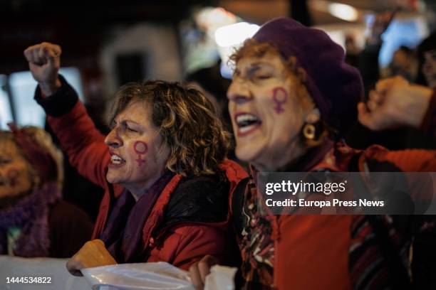 Two women during a demonstration against male violence in the district of Vallecas, on 25 November, 2022 in Madrid, Spain. The protest has been...