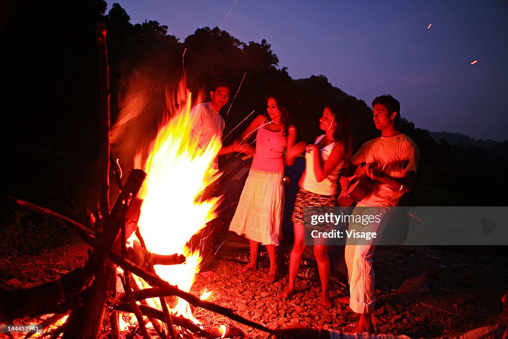 Friends in a campfire