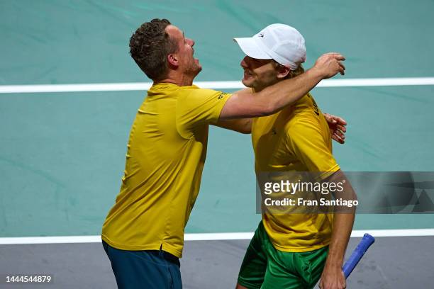 Jordan Thompson of Australia and Max Purcell of Australia celebrate with Lleyton Hewitt, captain of Australia after winning the Davis Cup by Rakuten...