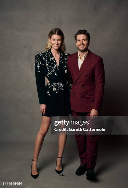 Hannah Cooper and Joel Dommett pose during a portrait session at the GAY TIMES Honours Awards 2022, held at Magazine London on November 25, 2022 in...