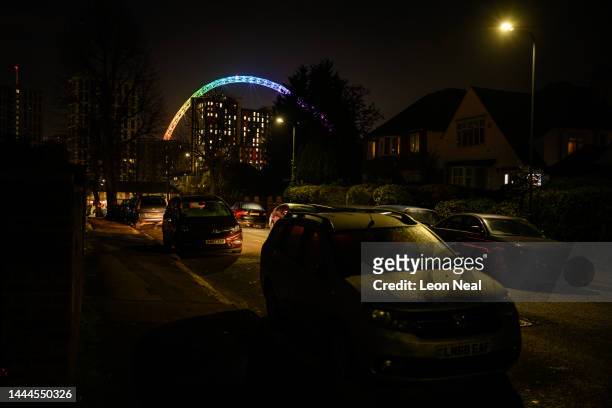 The Wembley Stadium arch is illuminated in rainbow colours, on November 25, 2022 in London, England. The Qatar 2022 World Cup match between England...