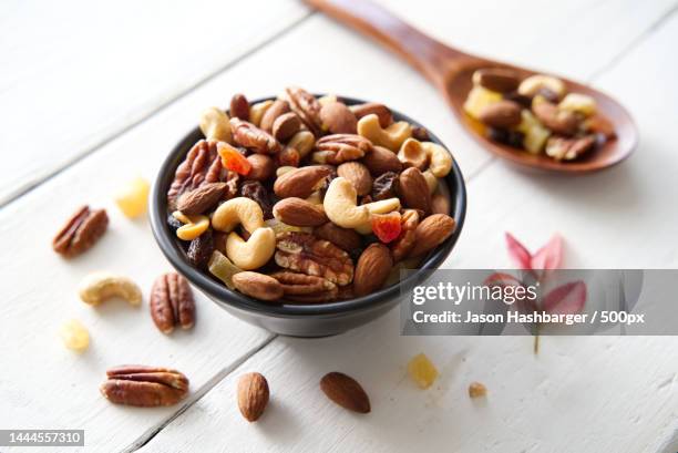 mix nuts and dried fruits background and wallpaper seen in top view of mix nuts a,united states,usa - ナッツ類 ストックフォトと画像