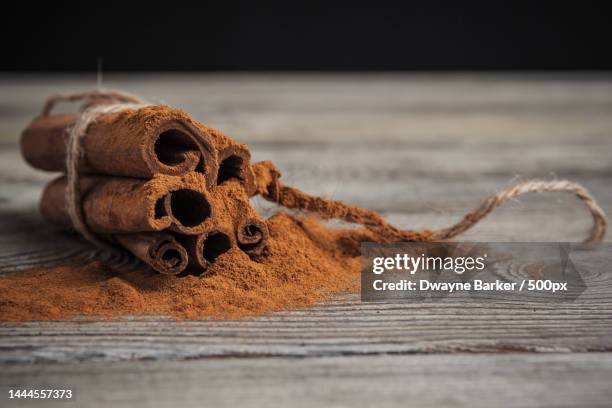 close-up of cinnamon on table,united states,usa - cinnamon imagens e fotografias de stock