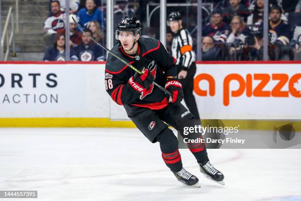 Martin Necas of the Carolina Hurricanes follows the play up the ice during first period action against the Winnipeg Jets at the Canada Life Centre on...