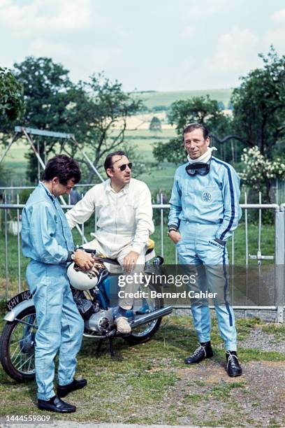 Jean-Pierre Beltoise, Jo Schlesser, Yves Montand, Grand Prix of Belgium, Circuit de Spa-Francorchamps, 12 June 1966. Yves Montand chatting with Jo...