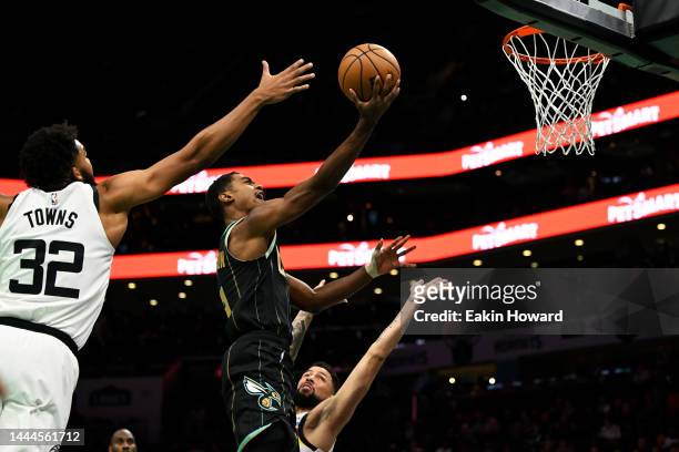 Theo Maledon of the Charlotte Hornets gets fouled on the way to the basket against the Minnesota Timberwolves in the first quarter at Spectrum Center...