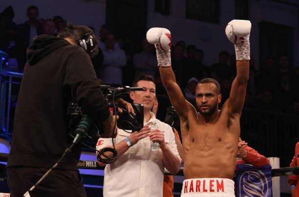 Harlem Eubank gets introduced before the start of his super lightweight bout with Tom Farrell at York Hall on November 25, 2022 in London, England.