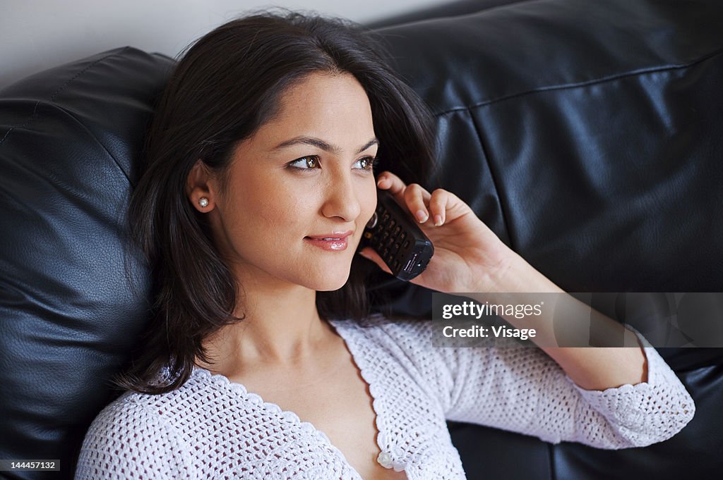Close up of a woman talking on a cellular phone