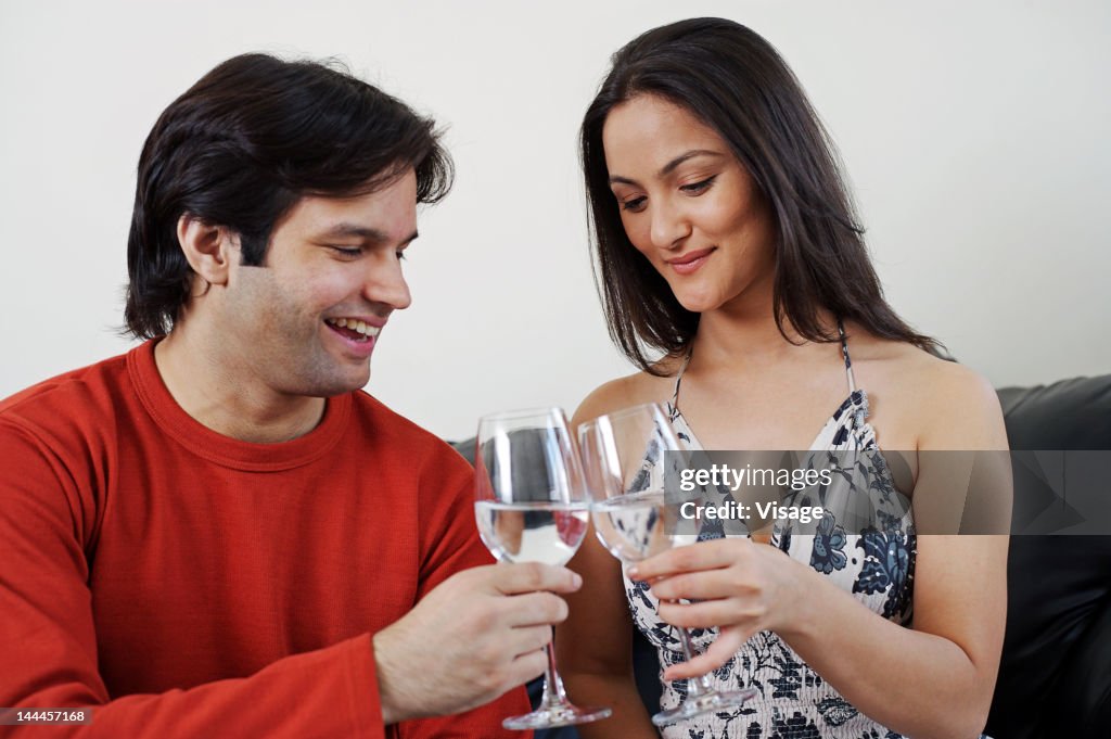 Couple raising toast