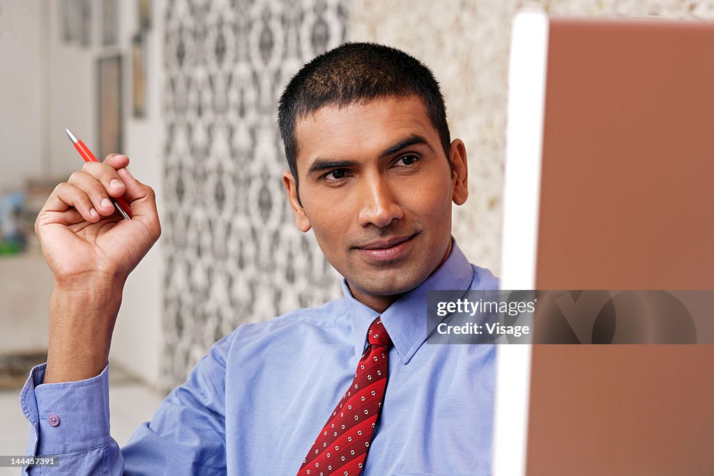 Young man using computer