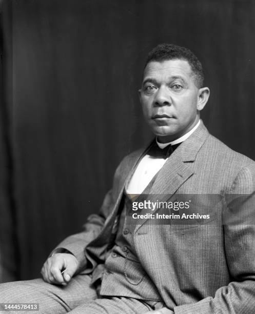 Seated studio portrait of American educator, economist, and industrialist Booker T Washington , founder of the Tuskegee Institute in Alabama, 1895.