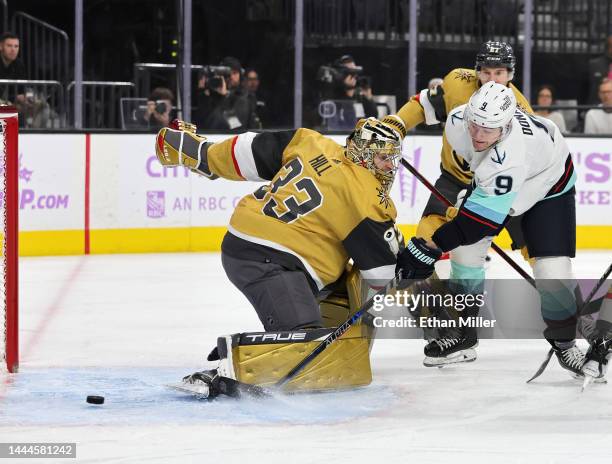 Ryan Donato of the Seattle Kraken scores a first-period goal against Adin Hill of the Vegas Golden Knights during their game at T-Mobile Arena on...