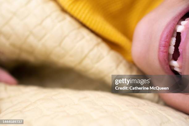 happy young mixed-race girl smiling & showing her two front missing teeth - tooth fairy stock pictures, royalty-free photos & images