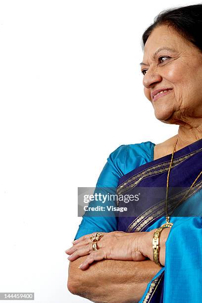 portrait of an elderly lady, posing, looking away - sari isolated stock pictures, royalty-free photos & images