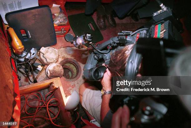 News camera person views an empty safe May 24, 2000 at the Formosa Cafe in Los Angeles, CA. The safe belonged to 1940''s gangster Benjamin "Bugsy"...