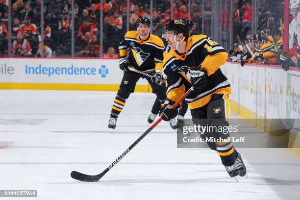 Josh Archibald of the Pittsburgh Penguins controls the puck against the Philadelphia Flyers at the Wells Fargo Center on November 25, 2022 in...