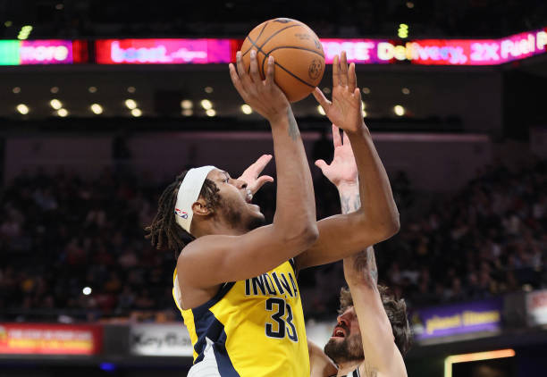 Myles Turner of the Indiana Pacers shoots the ball against the Brooklyn Nets at Gainbridge Fieldhouse on November 25, 2022 in Indianapolis, Indiana....
