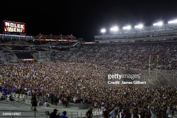 General view as fans storm the field after the Florida State Seminoles defeated the Florida Gators 45-38 in a game at Doak Campbell Stadium on...
