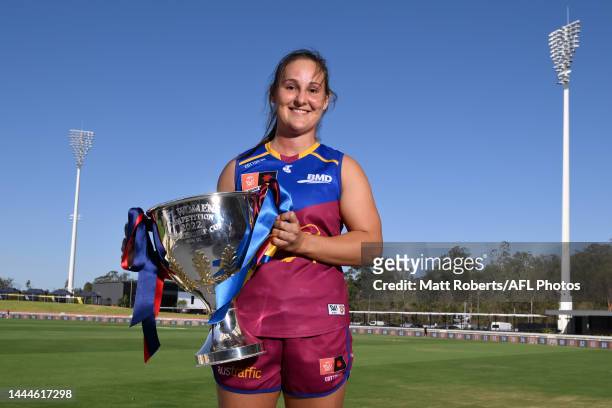 Breanna Koenen of the Lions poses with the trophy after a press conference ahead of the AFLW Grand Final between the Brisbane Lions and Melbourne...