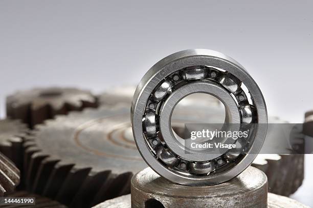 a ball bearing - ball bearings stock-fotos und bilder