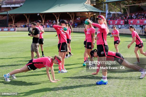 The Sixers warm up before the Women's Big Bash League Final between the Sydney Sixers and the Adelaide Strikers at North Sydney Oval, on November 26...