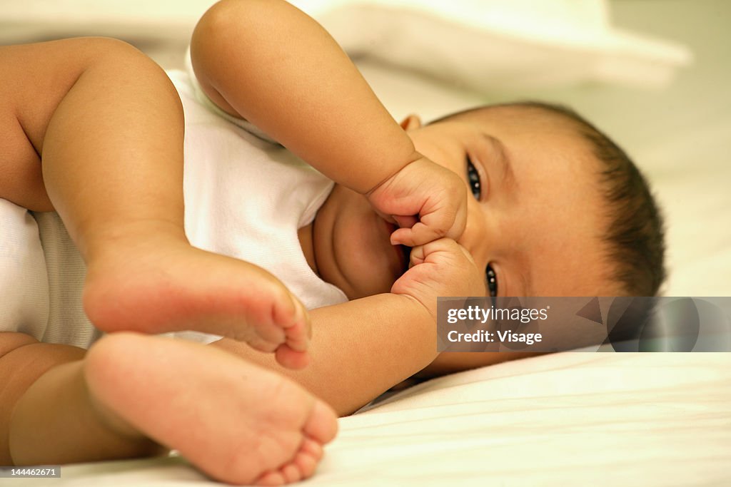 Close up of a baby playing