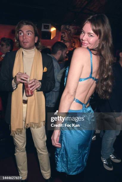 Simon Colin from "Les Clochards Celestes" and Helene Clabecq attend the Playboy Party at Chez Lulu On November 25, 2022 In Paris, France.
