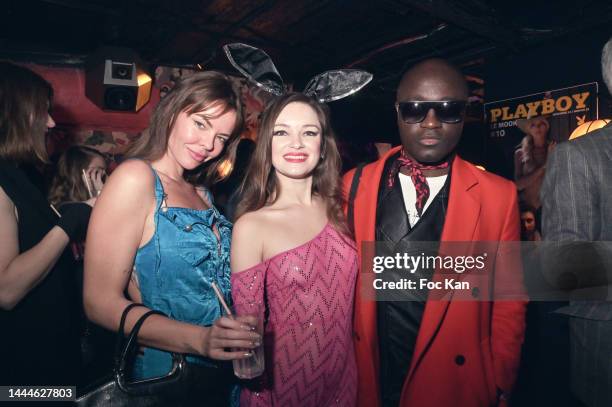 Helene Clabecq, Elena Siberia and DJ Harvey Ambomo attend the Playboy Party at Chez Lulu On November 25, 2022 In Paris, France.