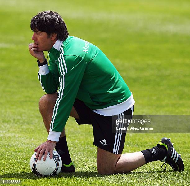 Head coach Joachim Loew follows a Germany training session at Campo Sportivo Comunale Andrea Dora on May 14, 2012 in Olbia, Italy.