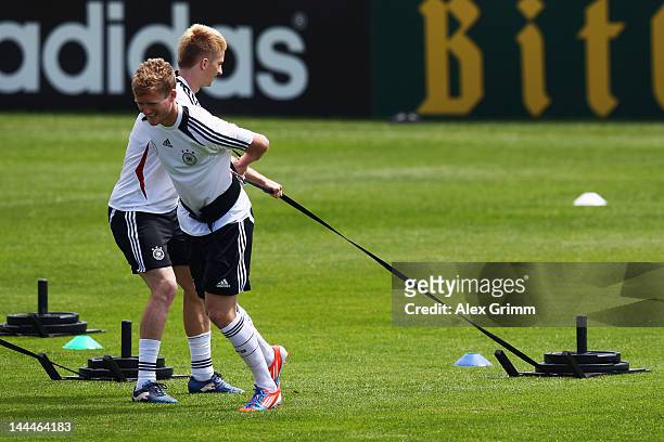 Marco Reus and Andre Schuerrle exercise during a Germany training session at Campo Sportivo Comunale Andrea Dora on May 14, 2012 in Olbia, Italy.