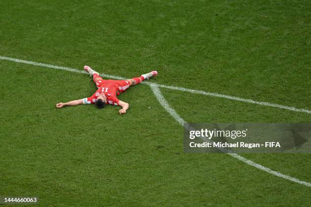 Gareth Bale of Wales looks dejected after the first Iran goal during the FIFA World Cup Qatar 2022 Group B match between Wales and IR Iran at Ahmad...