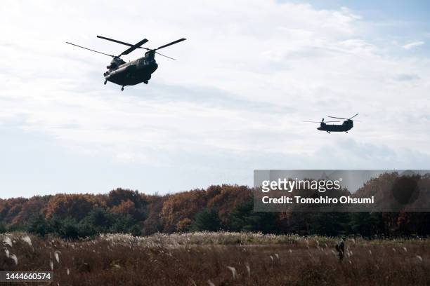 Chinook helicopters fly during the joint Japan Ground Self-Defense Force and British Army field exercise "Vigilant Isles 22" at Soumagahara...