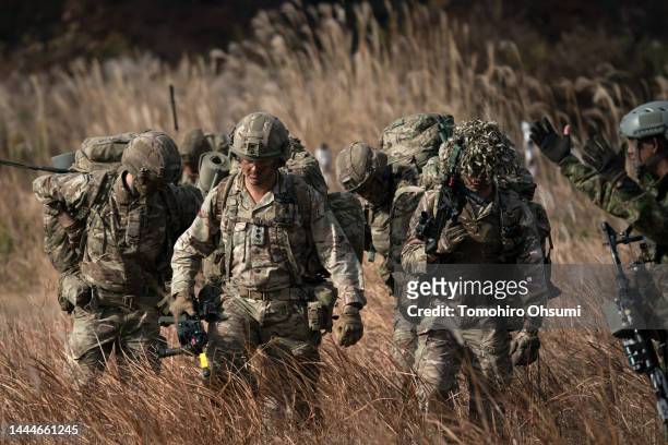Members of the Japan Ground Self-Defense Force and soldiers of the British Army take part in the joint field exercise "Vigilant Isles 22" at...