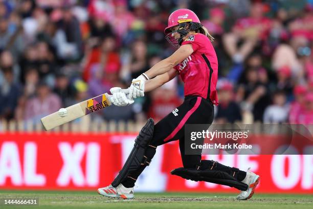 Ellyse Perry of the Sixers bats during the Women's Big Bash League Final between the Sydney Sixers and the Adelaide Strikers at North Sydney Oval, on...