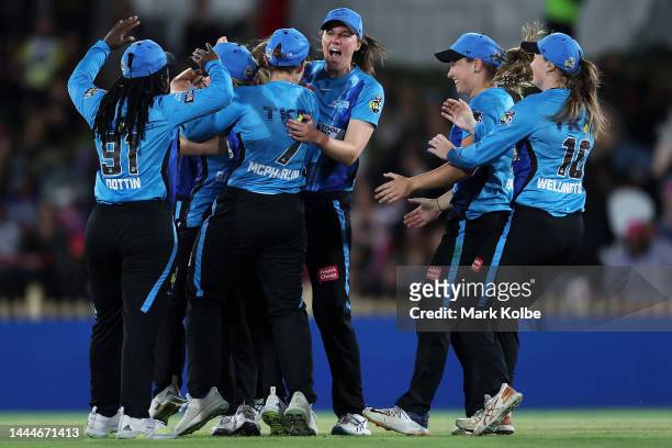 Darcie Brown of the Strikers celebrates with his team after taking the wicket of Ellyse Perry of the Sixers during the Women's Big Bash League Final...