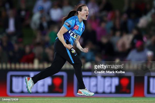 Megan Schutt of the Strikers celebrates taking the wicket of Sophie Ecclestone s during the Women's Big Bash League Final between the Sydney Sixers...