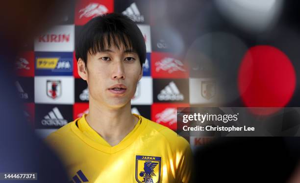 Daichi Kamada of Japan is interviewed during the Japan Training Session at Al Sadd SC New Training Facilities on November 25, 2022 in Doha, Qatar.