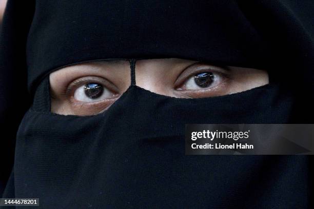 Women wearing burka attends the FIFA World Cup Qatar 2022 Group H match between Uruguay and Korea Republic at Education City Stadium on November 24,...