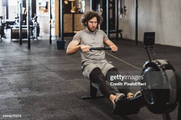Male Rowing Machine 670 Man Rowing Machine Stock Photos, High-Res Pictures, and Images ...