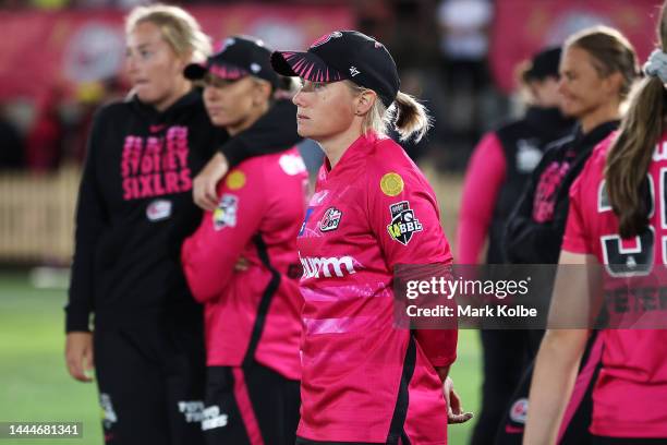 Alyssa Healy of the Sixers looks dejected after defeat in the Women's Big Bash League Final between the Sydney Sixers and the Adelaide Strikers at...